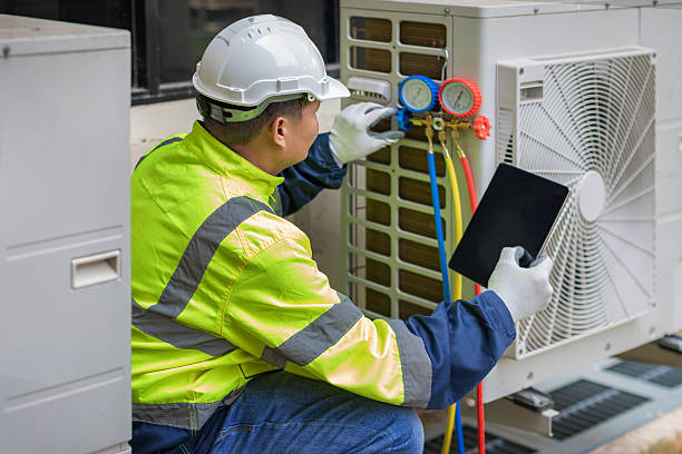 Professional Heat Pump Repair technician working in West Point, VA